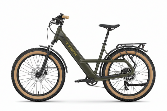 A Trek electric bicycle in olive green with tan sidewall tires, a black saddle, and a rear cargo rack, shown against a plain white background.